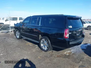 2016 GMC Yukon XL SLT with VIN 1GKS2GKC0GR443634, listed as a IAAI auction lot 41379064 with 121,744 mi miles. Bid and sale history available at carsss.com. Image 3.