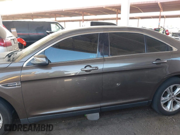 2015 Ford Taurus SEL with VIN 1FAHP2H87FG176103, listed as a IAAI auction lot 41950844 with 205,014 mi miles. Bid and sale history available at carsss.com. Image 14.