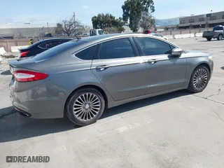 2013 Ford Fusion Titanium with VIN 3FA6P0K98DR216885, listed as a IAAI auction lot 41838680 with 164,182 mi miles. Bid and sale history available at carsss.com. Image 4.