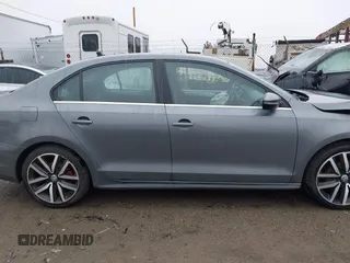 2012 Volkswagen Jetta GLI Autobahn with VIN 3VW5A7AJ5CM410777, listed as a IAAI auction lot 41729287 with 116,427 mi miles and . Bid and sale history available at DreamBid. Image 13.