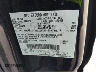 2004 Ford F-150 XL with VIN 1FTRF12W34KD85187, listed as a IAAI auction lot 41737266 with 105,101 mi miles. Bid and sale history available at carsss.com. Image 9.
