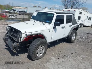 2012 Jeep Wrangler Unlimited Sport z VIN 1C4HJWDG0CL222194, wystawiony jako IAAI lot #42076024 z przebiegiem Nie podano mil oraz . Historia ofert i sprzedaży dostępna na DreamBid. Obrazek 2.