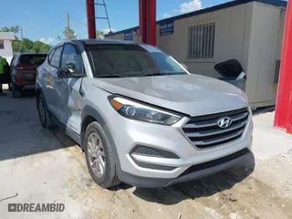2018 Hyundai Tucson SE with VIN KM8J23A48JU646278, listed as a IAAI auction lot 41941577 with 115,228 mi miles. Bid and sale history available at carsss.com. Image 1.