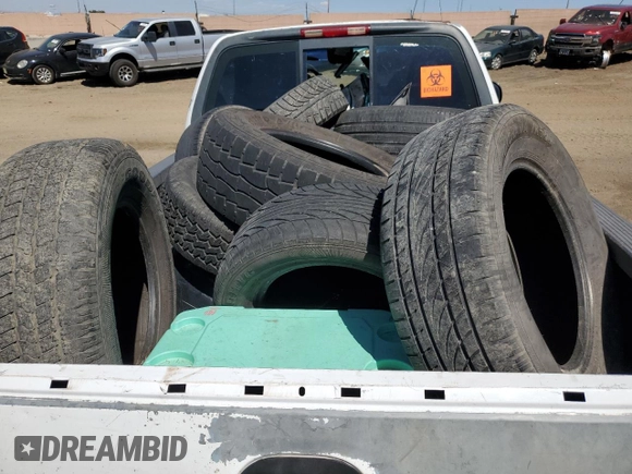 2000 Ford F-150 XL with VIN 1FTZF0727YKA84301, listed as a Copart auction lot 71593544 with 0 mi miles and Salvage Title. Bid and sale history available at carsss.com. Image 10.