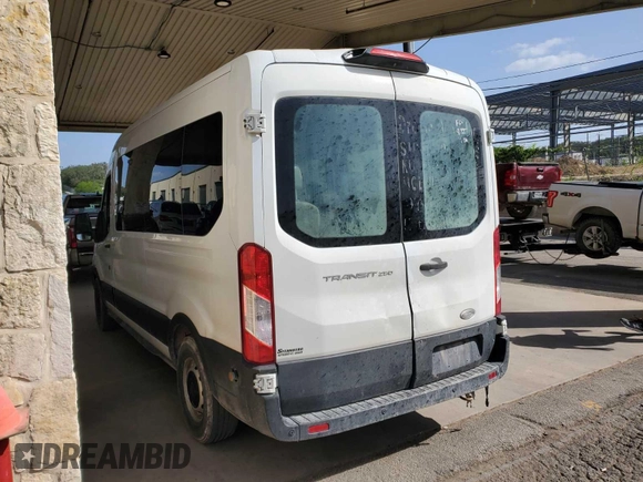 2019 Ford Transit Passenger XL z VIN 1FBAX2CM8KKA85224, wystawiony jako IAAI lot #42845272 z przebiegiem 142 658 mil mil oraz . Historia ofert i sprzedaży dostępna na DreamBid. Obrazek 14.