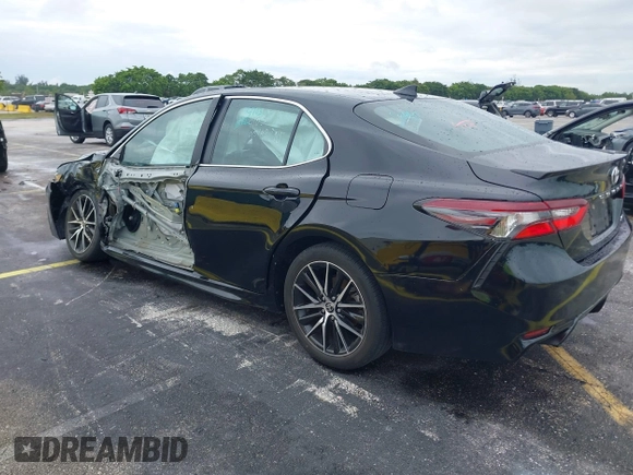2023 Toyota Camry SE z VIN 4T1G11AK4PU121775, wystawiony jako IAAI lot #42236239 z przebiegiem 51 146 mil mil oraz . Historia ofert i sprzedaży dostępna na DreamBid. Obrazek 3.