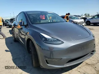 2023 Tesla Model Y Performance z VIN 7SAYGDEF9PF865129, wystawiony jako Copart lot #50228735 z przebiegiem Nie podano mil oraz Szkoda całkowita • Salvage title. Historia ofert i sprzedaży dostępna na DreamBid. Obrazek 11.
