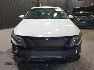 2018 Kia Optima LX z VIN 5XXGT4L34JG252028, wystawiony jako IAAI lot #41979909 z przebiegiem 90 113 mil mil oraz . Historia ofert i sprzedaży dostępna na DreamBid. Obrazek 6.