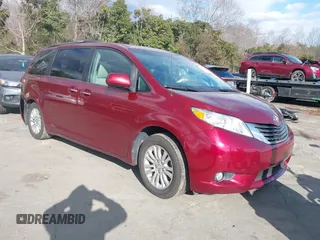 2014 Toyota Sienna XLE with VIN 5TDYK3DCXES442968, listed as a IAAI auction lot 41241310 with 132,020 mi miles. Bid and sale history available at carsss.com. Image 1.