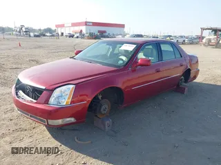 2008 Cadillac DTS 1SC with VIN 1G6KD57Y08U143396, listed as a IAAI auction lot 40618555 with 124,706 mi miles and . Bid and sale history available at carsss.com. Image 2.