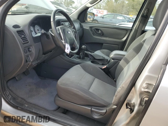 2005 Ford Escape XLS Value with VIN 1FMYU02Z35KB25309, listed as a Copart auction lot 50979315 with 117,908 mi miles and Salvage title. Bid and sale history available at DreamBid. Image 7.