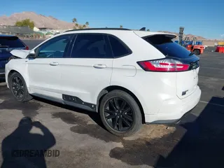 2020 Ford Edge SEL z VIN 2FMPK3J92LBB53467, wystawiony jako IAAI lot #41241115 z przebiegiem 58 183 mil mil oraz . Historia ofert i sprzedaży dostępna na DreamBid. Obrazek 3.