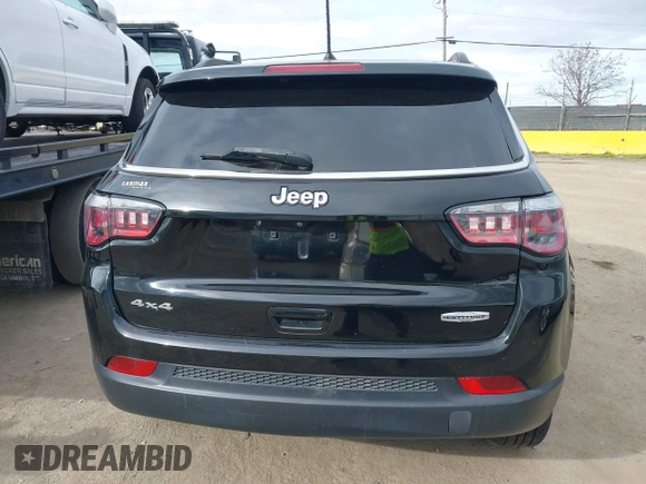 2018 Jeep Compass Altitude with VIN 3C4NJDBB0JT484409, listed as a IAAI auction lot 41656179 with 85,436 mi miles and . Bid and sale history available at carsss.com. Image 16.