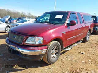 2003 Ford F-150 XL with VIN 1FTRX17W43NA07186, listed as a IAAI auction lot 41864354 with 123,565 mi miles. Bid and sale history available at carsss.com. Image 17.