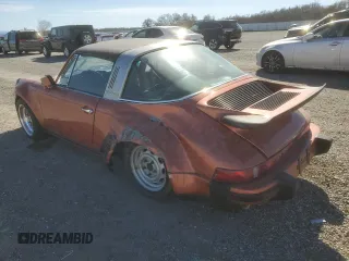 1974 Porsche 911 with VIN 9114111882, listed as a Copart auction lot 47080465 with 4,828 mi miles and Salvage title. Bid and sale history available at DreamBid. Image 2.