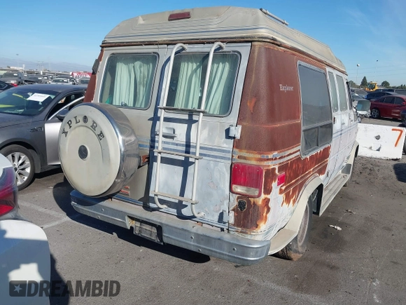 1989 GMC Vandura z VIN 1GDEG25K1K7521984, wystawiony jako IAAI lot #41371811 z przebiegiem 43 502 mil mil oraz . Historia ofert i sprzedaży dostępna na DreamBid. Obrazek 4.