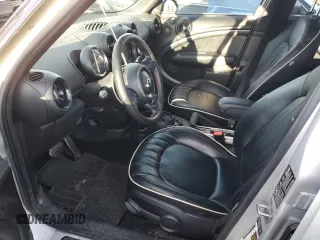 2015 MINI Countryman John Cooper Works with VIN WMWXD1C53FWS34815, listed as a Copart auction lot 74667224 with 94,971 mi miles and Salvage Title. Bid and sale history available at DreamBid. Image 7.