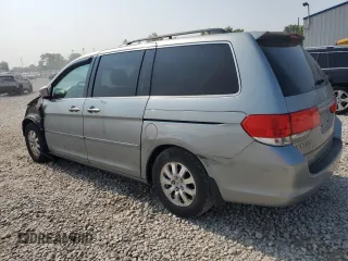 2010 Honda Odyssey EX-L z VIN 5FNRL3H74AB034608, wystawiony jako Copart lot #59262505 z przebiegiem 243 186 mil mil oraz Szkoda całkowita • Salvage title. Historia ofert i sprzedaży dostępna na DreamBid. Obrazek 2.