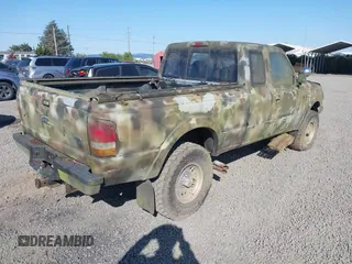 1994 Ford Ranger Splash with VIN 1FTCR15X5RPB38023, listed as a IAAI auction lot 42071158 with 239,152 mi miles. Bid and sale history available at carsss.com. Image 4.