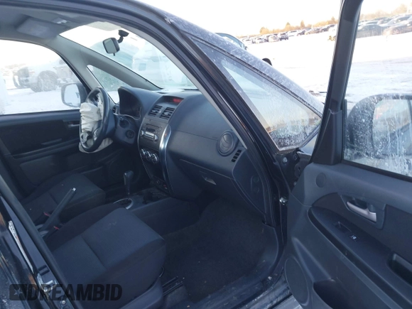 2008 Suzuki SX4 Touring Pkg 2 with VIN JS2YC417785100372, listed as a IAAI auction lot 41411720 with 179,468 mi miles. Bid and sale history available at carsss.com. Image 5.