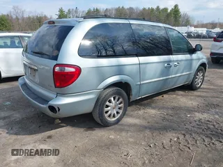 2002 Chrysler Town & Country LX with VIN 2C4GP44372R576005, listed as a IAAI auction lot 42092478 with 165,018 mi miles. Bid and sale history available at carsss.com. Image 4.