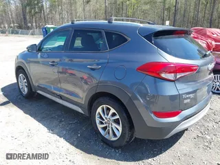 2017 Hyundai Tucson Value with VIN KM8J33A23HU405296, listed as a IAAI auction lot 41887237 with 114,027 mi miles. Bid and sale history available at carsss.com. Image 3.