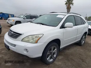 2007 Lexus RX 400h with VIN JTJGW31UX72001443, listed as a IAAI auction lot 42174586 with 191,431 mi miles and . Bid and sale history available at DreamBid. Image 2.