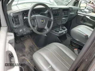 2015 Chevrolet Express Passenger LS with VIN 1GAWGPFG0F1141701, listed as a Copart auction lot 62818685 with 63,219 mi miles and Salvage title. Bid and sale history available at DreamBid. Image 8.