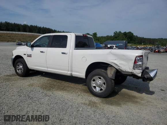 2015 Ram 2500 with VIN 3C6TR4DT4FG573333, listed as a Copart auction lot 54758515 with 182,000 mi miles and Salvage title. Bid and sale history available at DreamBid. Image 2.