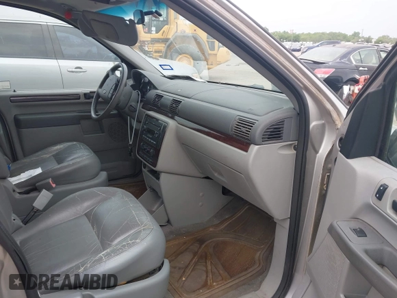2006 Ford Freestar SEL z VIN 2FMZA52216BA05064, wystawiony jako IAAI lot #42058806 z przebiegiem 157 991 mil mil oraz . Historia ofert i sprzedaży dostępna na DreamBid. Obrazek 5.