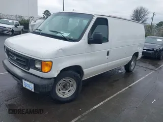 2004 Ford Econoline Cargo with VIN 1FTRE14W94HA87305, listed as a IAAI auction lot 41719727 with Not Provided miles. Bid and sale history available at carsss.com. Image 2.