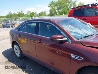 2016 Ford Taurus SEL z VIN 1FAHP2H8XGG136549, wystawiony jako IAAI lot #42338455 z przebiegiem 170 123 mil mil oraz . Historia ofert i sprzedaży dostępna na DreamBid. Obrazek 14.