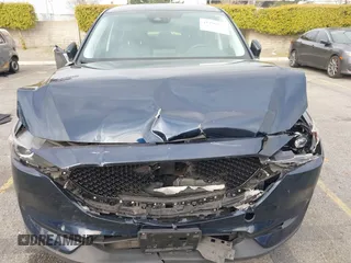 2019 Mazda CX-5 Touring with VIN JM3KFACM5K0697137, listed as a IAAI auction lot 41720253 with 50,416 mi miles. Bid and sale history available at carsss.com. Image 6.