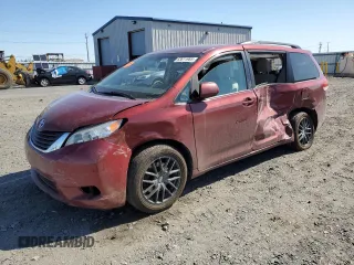 2014 Toyota Sienna LE with VIN 5TDJK3DC5ES093932, listed as a Copart auction lot 63611985 with Not provided miles and Salvage title. Bid and sale history available at DreamBid. Image 1.