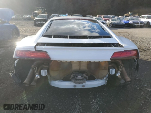 2018 Audi R8 V10 z VIN WUABAAFX5J7902445, wystawiony jako Copart lot #80124934 z przebiegiem Nie podano mil oraz Szkoda całkowita • Salvage title. Historia ofert i sprzedaży dostępna na DreamBid. Obrazek 6.