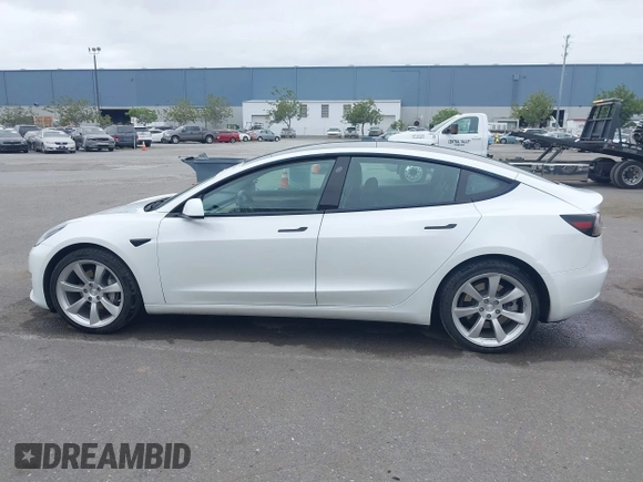 2023 Tesla Model 3 z VIN 5YJ3E1EA8PF437584, wystawiony jako IAAI lot #42112679 z przebiegiem 52 574 mil mil oraz . Historia ofert i sprzedaży dostępna na DreamBid. Obrazek 14.