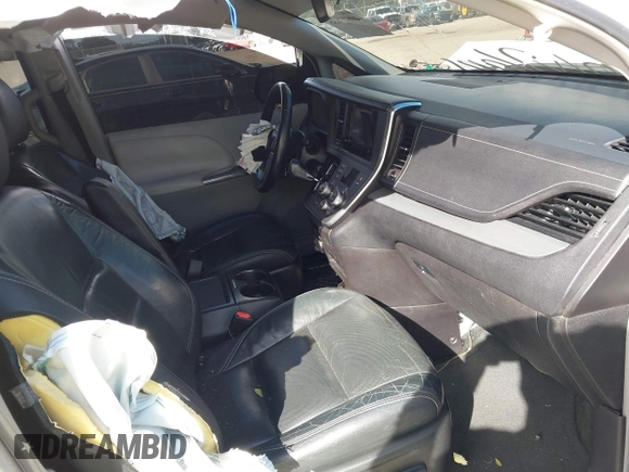 2015 Toyota Sienna SE with VIN 5TDXK3DC4FS678965, listed as a IAAI auction lot 40817635 with 147,027 mi miles. Bid and sale history available at carsss.com. Image 5.