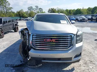2018 GMC Yukon XL SLT with VIN 1GKS1GKC6JR113510, listed as a IAAI auction lot 42006987 with 161,389 mi miles and . Bid and sale history available at carsss.com. Image 11.