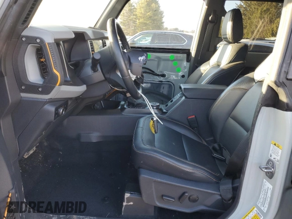 2023 Ford Bronco with VIN 1FMEE5DP8PLB93420, listed as a Copart auction lot 42247495 with 8,802 mi miles and Salvage Title. Bid and sale history available at DreamBid. Image 7.