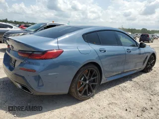 2022 BMW 8 Series M850i with VIN WBAGV8C05NCH25299, listed as a Copart auction lot 57378503 with 0 mi miles. Bid and sale history available at carsss.com. Image 3.
