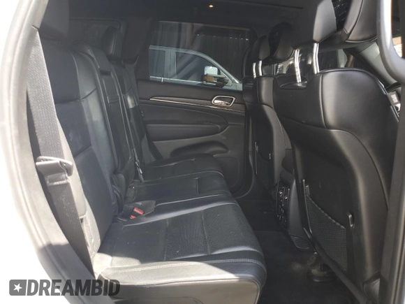 2018 Jeep Grand Cherokee High Altitude with VIN 1C4RJFCT9JC293653, listed as a Copart auction lot 58833145 with 96,808 mi miles and Salvage title. Bid and sale history available at DreamBid. Image 10.