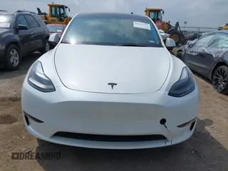 2023 Tesla Model Y Long Range with VIN 7SAYGAEEXPF776370, listed as a IAAI auction lot 42127512 with 27,120 mi miles and . Bid and sale history available at DreamBid. Image 13.
