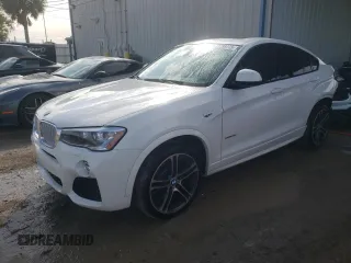 2015 BMW X4 xDrive35i with VIN 5UXXW5C51F0E87978, listed as a Copart auction lot 77793773 with 96,152 mi miles. Bid and sale history available at carsss.com. Image 1.