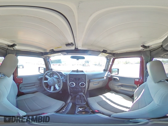 2008 Jeep Wrangler Sahara z VIN 1J4FA54198L505014, wystawiony jako Copart lot #55328045 z przebiegiem 128 049 mil mil oraz Szkoda całkowita • Salvage title. Historia ofert i sprzedaży dostępna na DreamBid. Obrazek 14.
