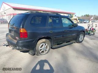 2005 GMC Envoy SLE with VIN 1GKDT13S852116252, listed as a IAAI auction lot 42086929 with 1 mi miles. Bid and sale history available at carsss.com. Image 4.