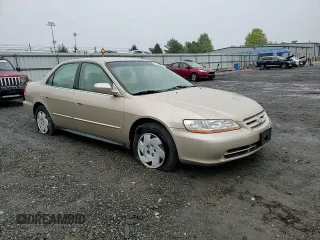 2002 Honda Accord LX z VIN 1HGCG16442A033722, wystawiony jako Copart lot #73108354 z przebiegiem 96 863 mil mil oraz Szkoda całkowita • Salvage title. Historia ofert i sprzedaży dostępna na DreamBid. Obrazek 11.