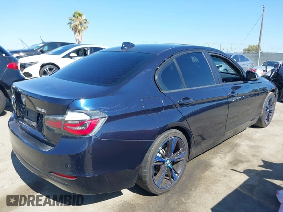 2015 BMW 3 Series 328i with VIN WBA3C1C50FK124300, listed as a IAAI auction lot 40112372 with 142,591 mi miles and . Bid and sale history available at carsss.com. Image 4.