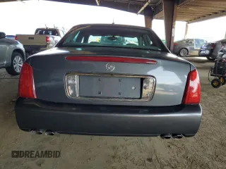 2005 Cadillac DeVille with VIN 1G6KD54Y95U246350, listed as a Copart auction lot 51002715 with 0 mi miles and Salvage Title. Bid and sale history available at carsss.com. Image 6.