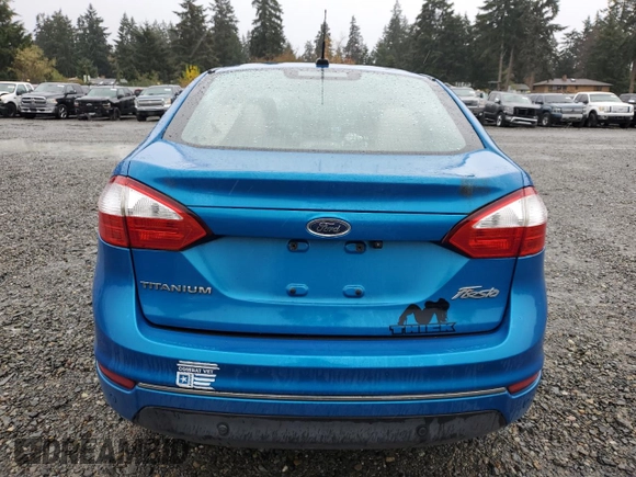2016 Ford Fiesta Titanium z VIN 3FADP4CJ3GM108313, wystawiony jako Copart lot #78457954 z przebiegiem 44 726 mil mil oraz Szkoda całkowita • Salvage title. Historia ofert i sprzedaży dostępna na DreamBid. Obrazek 6.