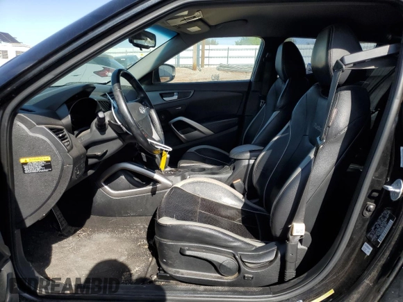 2013 Hyundai Veloster Turbo z VIN KMHTC6AE2DU169366, wystawiony jako Copart lot #50805585 z przebiegiem 75 197 mil mil oraz Szkoda całkowita • Salvage title. Historia ofert i sprzedaży dostępna na DreamBid. Obrazek 7.